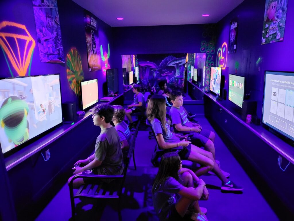 Glowing arcade and console room at Play Money